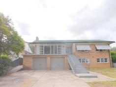  81 Macquarie St Cowra NSW 2794 $315,000 Family Home Plus Granny Flat You will be pleasantly surprised upon inspecting this home, lets begin upstairs. Upon entering the home there are fresh polished floor boards that run throughout the whole home making it feel light and airy. The kitchen has been recently renovated with a modern and clean look that flows through to the large lounge and dining area. Head down the hallway to the 4 bedrooms (2 with built ins), bathroom and separate toilet. Plus there is a second living area/sunroom perfect for a kids playroom. Head down the internal staircase to the large double length garage with extra space for storage and electric roller doors. Also downstairs is the self-contained Granny Flat with lounge and dining area, bedroom with built ins, separate kitchen and bathroom with its own private external entry. If your short on time, then the neat and tidy back yard is easy to manage and allows more time to enjoy life. Note: Agent declares interest. 