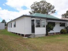  97 Scott St Tenterfield NSW 2372 $158,000 Nice and Handy Located in a handy position close to Tenterfield Bowling Club and shopping centre, this three bedroom weatherboard home has views over Shirley Park - watch the cricket in summer and soccer in winter! Three bedrooms, two sunrooms, lounge with wood heater, kitchen with gas stove, bathroom and separate toilet. Entertain under the shady pergola. A tidy 809m2 block fully fenced with single car accommodation and workshop. Inspection recommended. 