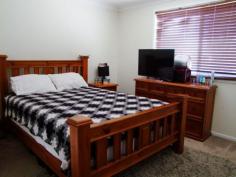  23 Kent St Greta NSW 2334 $380,000 Invest or Move in… Set on approx. 1024 Sqm this well presented brick & tile home could be your next home or a viable addition to your investment portfolio. It features a modern kitchen with dishwasher, floating floorboards & light filled open plan living & dining with reverse cycle split system A/C. The master has mirrored built in robes, ceiling fan & ensuite. Bedrooms 2,3 & 4 are all double sized with a built in robe to bed 2. Outdoors you will find a fully fenced yard with driveway access, concrete area, double colorbond shed, vegetable garden beds, garden shed and fenced off area ideal for a chicken or dog pen. Located just minutes drive from the Hunter Expressway. 