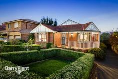  19 Wollahra Pl Heathmont VIC 3135 Federation Inspiration Soaks Up Serene Views Elevated to soak up spectacular Mt Dandenong vistas and positioned within a quiet, sought-after court, beyond the picket fence and rose garden sits a postcard-perfect family home, not only generous in space and size, but lays out before you a style and charm to make you feel instantly at home. Greeted by a generous return verandah and beautiful box bay windows with leadlight features, Federation styling has been intrinsically woven throughout the visually-appealing and arresting interior; ceiling roses, hall arches, polished timber floors and even down to the smallest details like the light switches to name just a few. Abundant room has been provided for rest and relaxation, beginning with the formal lounge and dining boasting stylish finishes, through to the fully-equipped timber kitchen and adjacent meals flowing into the separate spacious family area and finally leading out to a deck to enjoy views of the Dandenongs. The floorplan has been truly well thought out and executed, ensuring free-flowing living areas from front to back. The master comprises a full ensuite and walk-in robe and is privately positioned away from the additional robed bedrooms that are located at the other end of the home along with an irresistibly-charming bathroom highlighting a claw foot bath with shower, timber vanity and decorative tiling to convey the feeling of a bygone era. The study provides an optional fourth bedroom, furthermore, the extensive list of inclusions are summarised as; gas ducted heating, electric wall oven, gas hotplates, dishwasher, highly-functional laundry and storage cupboards, grassy rear yard, remote double garage under house with rear access as well as a workshop/storage area and additional under-house storage. Ideally located within walking distance to; Wombolano Park, Heathmont Railway Station, Heathmont East Preschool and Heathmont Village with its restaurants, cafes and fresh produce shops, as well as only a short commute to; Tintern Grammar, Aquinas College, Ringwood Aquatic Centre, EastLink and Eastland. A perfectly balanced blend of modern conveniences with the classic elegance of yesteryear, this immaculately-presented residence is a rare opportunity not to be missed. Enquire today. Photo ID Required Features Workshop Built-In Robes Dishwasher Remote Garage Study Price Guide: Contact Agent   |  Land: 655 sqm approx 	  |  Type: House  |  ID #553338 