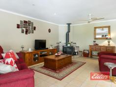  14 Sugar Gum Ct Jimboomba QLD 4280 $599,000 OMG – How Good Is This ! An outstanding opportunity to secure this substantial family home, surrounded by mature gardens, with the pool, the spacious outdoor entertainment area and an equally impressive shed already in place. With wide frontage and an electric gate at each end of the semi-circular driveway, your 1st impression will be a good one and it just keeps getting better, as you begin to see more of this well presented property. Large living spaces and ducted air-conditioning await your inspection, with the carpeted formal lounge set away from the rest, leading through to the spacious family room, with feature combustion heater in the corner, the dining area off and then on through twin 10 panel glass doors to the huge rumpus beyond. The hub of the home is the kitchen and once again it’s good news, with gas cooking, an electric oven and abundant high and low line cupboards, with heaps of bench space and a corner pantry included for good measure and the fridge space is excellent, enough for a matched fridge / freezer set. Bedrooms – more good news ! The master bedroom, set away from the rest is simply huge as you may be able to tell from our images. The next big surprise is the walk-in robe, which is also huge, so wardrobe space is unlikely to be an issue, and in keeping with everything else, the en-suite is also well appointed with both a corner Spa bath and a shower in this very spacious room. Bedroom 5 or the Study, is once again spacious and this theme continues through the other bedrooms, each of which has a large double built-in robe and ranges in size from large to extra-large. If you have been looking for a large family home with big bedrooms, then this is most definitely THE ONE ! Moving outside, you can all kick back and relax with your family and friends in the substantial outdoor entertainment area which also includes a built-in Bar and all of this is perfectly positioned, overlooking that sparkling (and I DO mean sparkling) in ground salt pool with cascade water feature, all of which combines to deliver a private and inviting outdoor entertaining experience with a genuine feel good factor. Moving beyond the pool and entertainment area, you’ll find a play area for the kids, before you reach the substantial shed, properly setup with its own safety switch and abundant power and lighting as you might expect. The mature gardens that I mentioned earlier have a real WOW Factor (which our photographer confirmed !) as you may be able to tell from our images, with a myriad of natives, fruit trees and shrubs delivering both privacy and interest, all of which have been established with low maintenance in mind; our owners appreciate the natural beauty that they created but did not want to be slaves to yard maintenance ! For those not familiar with the local area, Jimboomba Township is just a few minutes away, while Browns Plains is a 20 minute drive and Brisbane CBD is yours within the hour. The GOLD Coast too is similarly accessible and you’ll also find a wide range of sporting, recreational and educational facilities all close at hand. So if you have been searching in vain for that almost mythical large family home, on a stunningly beautiful block, with large living areas, big bedrooms, the pool, the outdoor entertainment area and the shed, then you really can’t afford to miss this one. An early inspection is MOST DEFINITELY recommended … Property Details Elders Property ID: 11181532 5 bedrooms 2 bathrooms 5 car parks Land Area 4353 square metres 5 car garage 