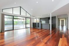  2 Filmer Pl Leeming WA 6149 $935,000 2 Filmer Place, LEEMING $935,000 FAMILY ENTERTAINER Open for Inspection:  Sat 4th Mar 1:30pm-2:15pm  Save    Creative and thoughtful design and a modern lifestyle blend to make this Leeming property feel like home. Set on a 727sqm corner block, the modern style of this 4/5 bedroom, 2 bathroom Webb and Brown-Neaves built home is instantly evident and draws you in wanting more. Upon entering the home you'll immediately be impressed by the wide entry hallway with stunning solid timber floors that extend throughout the open living. The home was well ahead of its time and has been cleverly designed into zoned living spaces, most with an outlook to the outdoor entertaining alfresco and swimming pool. The kitchen is central to the entertaining and living zones of the home so you'll always feel part of the action. It includes glass splash back, breakfast bench, a double fridge recess and modern appliances making it both attractive and functional. It is open plan to the dining area and lounge with impressive high raked ceiling creating a great feeling of space. The spacious tiled games room also has direct access to the outdoor bar and alfresco while the cosy theatre room with high raked ceiling is the perfect hideaway to watch a movie in peace.  Entertaining in this beautiful home is a delight. The timber decked alfresco and outdoor bar with stone bench top will be central to many gatherings and is all under the main roof, adding to the flowing feel of the home. The outdoor living overlooks the crystal blue swimming pool, complete with poured limestone surrounds and unobtrusive glass pool fencing. The roomy master suite features a generous walk-in robe and a timeless ensuite with large spa bath, double vanity, semi-frameless shower and separate toilet that all make this space your sanctuary. The 3 remaining bedrooms are located at the rear of the home and feature built-in robes and ceiling fans. The study or fifth bedroom is privately located at the front of the home.  The location is fantastic, only a short walk from Leeming high school and primary, the shops and cafes of Leeming Forum and parks and a short drive to Fiona Stanley hospital, Murdoch University, Bull Creek train station and freeway access. West Leeming and Bibra Lake primary school zones. It has all the extras including smart wiring, reverse-cycle air-conditioning, a double remote garage, security system, reticulation, large garden shed, freshly painted throughout, new additional lighting and great storage making organising life simple. Doesn't your family deserve the quality and lifestyle this beautiful home provides? Contact David Gooding for further details or viewing times. 