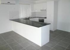  64 Moonlight Dr Brassall QLD 4305 $350 per week MODERN LIVING IN MOONLIGHT! - Owner is after a 12 month lease  - 4 bedroom brick home with ensuite to the main  - Walk in robe to the main and built in robes to the remaining 3 bedrooms  - Separate lounge room with air-conditioning  - Modern open plan kitchen, family and meals area  - Ceiling fans and air-conditioning throughout  - Undercover outdoor patio for entertaining  - Double lock up garage with security screens throughout  - Fully fenced yard and easy to maintain gardens  - 9 k's from Ipswich CBD, close to schools, shops and transport. 20 mins to RAAF Base Amberley.  - Pets on application  Please email your enquiry and one of our staff members will email or SMS you when it is available to inspect. To download an application, please copy and paste the below link into your web browser: Property Features Bond : $1400 
