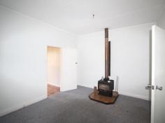  97 Scott St Tenterfield NSW 2372 $158,000 Nice and Handy Located in a handy position close to Tenterfield Bowling Club and shopping centre, this three bedroom weatherboard home has views over Shirley Park - watch the cricket in summer and soccer in winter! Three bedrooms, two sunrooms, lounge with wood heater, kitchen with gas stove, bathroom and separate toilet. Entertain under the shady pergola. A tidy 809m2 block fully fenced with single car accommodation and workshop. Inspection recommended. 