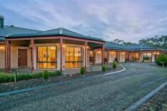  250 Martin Hill Rd Forreston SA 5233 $2,150,000 LUXURY COUNTRY LIVING AT ITS BEST Property ID: 10072660 The ultimate in luxury living with a 68.5 acre playground offering peace, security and privacy in this large gracious c2003 residence set in a wonderful landscaped garden. The residence takes in the magnificent views of the surrounding countryside. The residence features 5 bedrooms, formal living, formal dining, informal dining and state of the art kitchen. Admire the extensive garden with its exotic trees and scrubs from the all round verandah. The 27.72Ha (68.5 acres) property offers prime hills grazing and supported by excellent shedding and water supply. Special features: c2003 solid brick residence built to the highest standards and finish. Large formal entrance with a welcoming Mosaic patterned floor. Formal living – timber skirtings & architraves, slow combustion heater and Italian tiles. Formal dining – designed for gracious entertainment on a grand scale with bay window overlooking the property and surrounding countryside. Luxury kitchen with stainless steel ‘Smeg’ 90 cm 6 hob gas cooktop and electric oven, dishwasher, ‘Black Galway’ granite bench tops and walk-in pantry. Box room/cellar off the pantry. Main bedroom with RC/AC, slow combustion heater, French windows that open to the garden & verandah. Very generous walk-in robes, plus a 5 star ensuite that features a 4 person spa, shower, white granite top basin unit, marble floor and floor to ceiling marble tiles. 4 other generous bedrooms (all carpeted and built-in robes. Tiled long hall with built-in cupboards running the full length. Luxury main bathroom with marble tiles and separate wc. Verandahs surround the residence. Laundry – fully tiled, 3rd wc & hand basin. Rumpus, which double as an extra kitchen and features an all important pizza/bread oven. Garden: The maturing garden has been planted with the future in mind, starting with the Golden Elm lined driveway to the rich shady English Oaks that are scattered around the garden. The needs of the kitchen have been considered with a large number of Olives, Chestnuts and other fruit trees planted to reap the benefit of this productive land. Other improvements: 14m x 6m s/f workshop/implement shed with conc. floor, power & light. Rainwater storage – 100,000 gal. Quality bore – 50 megl water licence. Fenced into 10 main paddocks. Land: The 27.72 Ha (68.5 acres) ranges from flat to very gently undulating grazing country with stock water. The land has been well managed with a good fertilizer history and a sensitivity to the need to preserve our native vegetation. Inspection highly recommended and strictly by appt. Land Area 	 27.72 hectares 