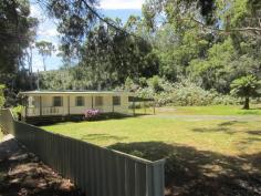  2 Innes Street Strahan TAS 7468 $198,000 Beautiful location Nestled in a sunny clearing with beautiful bushland, the views to the distant mountains and Macquarie Harbour at sunrise and sunset are spectacular. The property is so close to much but also very private. West Strahan beach, the local school, shops, caf, medical centre, post office and wharf are all within walking distance.  The home has two bedrooms, both with built in wardrobes, a separate dining room which leads to the rear undercover deck, a galley style kitchen and a good size lounge room. The property is partially fenced with a brand new colour bond fencing, there is a small shed for storage and a double car port which enables access from the vehicle to inside all under cover. The drapes in the lounge room are new and the heating electric.  Inspection is strictly by appointment only, please contact our Sales Consultant for further information. General Features Property Type: House Bedrooms: 2 Bathrooms: 1 Land Size: 948 m2 
