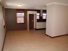 38 Wilmot Place Singleton NSW 2330 $320,000 A Great Place to Start * Massive 1416m2 sloping block * All bedrooms have ceiling fans, main with split system air conditioner * L shape tiled lounge/dining room * Kitchen overlooks back verandah * Fabulous outlook to council reserve 