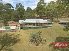  18 Saturn Ct Cedar Vale QLD 4285 Large Colonial home - must be SOLD! A job transfer to Western Australia has changed all the plans this family had for this big home - so it’s got to be sold as they are staying put in W.A. They were partially through the renovations, so there is some work still to be done, so here is your opportunity to purchase the home and make it exactly what you want. It’s a very big home and it boasts 6 bedrooms (all air conditioned), 3 bathrooms, formal lounge, open plan dining and kitchen, family room and a large fully screened and covered sun room. There are polished timber flooring, 9’celings with decorative ceiling roses, gas cooking and solar hot water system. The home is a Colonial style and has great street appeal, with a large front bull nosed veranda looking out to the 2 acres, there is also a salt water inground pool with a very large concreted area, a 6m x 6m shed and a 3-bay carport.  The location of this house is quiet and peaceful, it’s in a cul de sac street and is placed right at the back of the block, it’s only a short drive to connect to the Mt. Lindesay Highway so a commute into Brisbane would be a breeze. If you wanted some animals there is a dam on the block, the home is connected to Council trickle feed water and there is school bus pickup in the area.  This house must be sold and is going to Auction on the 25/3/2017 at 10am – come and have a look I know you will be impressed with the size and all that this home offers. Property Details Elders Property ID: 11102937 6 bedrooms 3 bathrooms 5 car parks Land Area 8500 square metres 5 car garage 