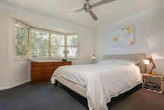  18 Killeen Cl Buderim QLD 4556 Buderim Queensland Entertainer on Large Block When size matters, a 926sqm property in the heart of Buderim is sure to get your attention. This high-set home offers all you could want in coastal living, with its elevated position capturing those cool breezes. This fully renovated home and functional floor plan is perfect for the family with four bedrooms, two bathrooms, generous kitchen, hardwood outdoor undercover entertaining area, wrap around Queenslander deck at the front for those lazy afternoons and a huge front yard for the kids to play in.  Perfectly presented, the home has beautiful polished hardwood timber floors throughout and white walls which keeps the house neutral. Add to that the beautiful timber french doors leading out to the undercover entertaining makes it perfect for friends and family to enjoy those late afternoon BBQ's. The spacious master bedroom has its own walk-in robe, ensuite with well-appointed fittings, above bench square basins and large square tiling and the main bathroom has a full length bath to relax in.  A split-system air-conditioner along with a ducted exhaust system which takes the cool air into the bedrooms, they are also fitted with ceiling fans. The kitchen has cottage style cabinetry with double sided storage and a large pantry, stone benches with an inset stainless sink and mixer. Fresh stainless appliances including a dishwasher, electric stove and ceran cooktop with a full length tiled splash back. On the lower level the home has ample storage with 2 garden sheds and a double lock up garage, with extra storage and electric doors.  This truly is a family home thanks to its large front yard, cul-de-sac location and its proximity to some of the coast's best schools including Mountain Creek State School, Matthew Flinders Anglican Collage and Sienna Catholic College which are just a short drive away. Headland Golf Club is also just a short drive away and the local shops are close by.  - Elevated Queenslander decked home, capturing cool breezes  - Perfect family home in a quiet cul-de-sac location on a massive 926sqm  - 4 bedrooms, 2 bathrooms, double lock-up garage with extra storage  - Outdoor under-cover hardwood entertaining deck for your BBQ's  - Beautiful polished timber floors throughout & carpeted bedrooms  - Air-conditioning with ducted exhaust system & ceilings fans in bedrooms  - Fully renovated & well-appointed bathrooms and kitchen PROPERTY DETAILS UNDER CONTRACT ID: 392804 Land Area: 926 m² 