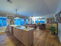  9 Persian Street Eglinton WA 6034 Built by Celebration Homes in 2015 this immaculately presented, professionally interior decorated home is set on a large 450sqm block. This 4 bedroom, 2 bathroom home has all the upgrades you are looking for. From timber flooring to essa stone bench-tops to quality light fittings. Its sure to impress! * 	 High ceilings and moulded skirting throughout * 	 Large master bedroom with walk in robe and shutters * 	 Luxurious en-suite with his and hers basin set on essa stone bench-top * 	 Built in double robes and TV points in 3 other bedrooms * 	 Open plan kitchen, living and meals area * 	 Gourmet kitchen with 900mm gas cook-top set on essa stone * 	 A large walk in pantry, double fridge recess and dishwasher recess * 	 Industrial style lighting over kitchen bench-top  * 	 Enclosed theatre room with feature bulkhead ceiling  * 	 Walk in linen room adjacent to laundry * 	 Zoned reverse cycle ducted air conditioning * 	 Wood burner in main living area * 	 Decked alfresco with gorgeous native plants in garden for easy maintenance * 	 Liquid limestone to side yard  * 	 Ample parking fitting up to 4 cars on driveway  Features  Built-In Wardrobes  Fireplace(s)  Garden 