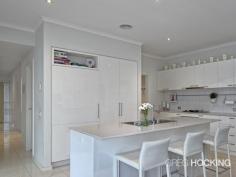  2 Inverness Pl, Heatherton VIC 3202 Contemporary in style with clean lines, large windows and an attractive rendered facade, this modern double storey residence in The Heath' enjoys quality finishes and appointments throughout together with all the lifestyle benefits of a quiet family friendly community. Adjacent to parkland and oriented to take advantage of the sunny north and west this stylish home features a bright lounge and dining room with gas fireplace, modern kitchen with Caesarstone benches and Smeg stainless steel appliances, adjoining open-plan family room with split system air-conditioning and full wall of handy cabinetry, direct access to a beautifully landscaped private courtyard with an under-cover alfresco entertaining patio protected by extensive cafe blinds, 3 upstairs large bedrooms with built-in robes, including main with ensuite - twin stone vanity, sleek bathroom with spa plus an extra rumpus room/study or even 4th bedroom, you choose! Downstairs powder room, laundry, plus large double garage with remote doors, work bench and handy mezzanine and cavity storage spaces. Extras include ducted heating and air-conditioning, alarm, wired for data throughout, central speaker system, energy efficient solar roof panels, external awnings, water tank, outside BBQ gas point and high ceilings. With numerous parks and walking tracks at your fingertips this secluded location is perfect for young families and within convenient proximity to Southland, DFO, Cheltenham Secondary College, Kingston Heath and Le Page Primary Schools, Kingston Heath Golf Course, and bus. 	 
