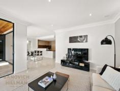  Lot A/45 Beach Street, Bicton WA 6157 LOW MAINTENANCE RIVERSIDE LUXURY HOME Ideally located just three blocks to the river and gently sloping above the road, this modern and luxuriously appointed home is positioned on a generous 505sqm Green Title block and offers multiple livings, huge bedrooms plus alfresco entertaining and easy care grounds. The functional layout has been designed with multiple living areas to provide excellent zones for all ages including theatre room with kitchenette, study/fifth bedroom downstairs, formal lounge and dining flowing onto second outdoor alfresco, open plan living room, additional downstairs powder room plus floor to ceiling tiles in all bathrooms. Watch the kids play in the backyard while preparing dinner from the gourmet chef’s kitchen featuring granite bench tops,900m wide oven, dishwasher, stainless steel appliances and plenty of storage. A spacious home throughout with over 340sqm of internal living area, the master bedroom suite is particularly impressive with balcony, massive walk in robe and en-suite featuring floor to ceiling tiles, bath tub, granite benchtops and double vanity. Built with quality throughout including granite bench tops, Aiphone video security intercom and alarm, zoned reverse cycle ducted air conditioning on both levels, high ceilings throughout and an abundance of built in cabinetry and storage. The undercover alfresco entertaining alfresco flows from the  main living area via bi fold doors and this area can be enclosed with built in cafe blinds to enjoy all year round. The terraced grounds provide ample space to play and room to install a pool if desired. Located just three blocks to the riverfront, around the corner to popular cafes and local shops, 10 minutes stroll to Bicton Primary School, Bicton Baths, Point Walter Reserve and golf course. 