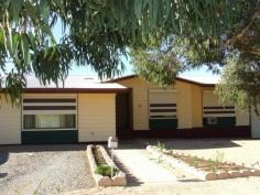  41 Cobbin St Port Augusta West SA 5700 $265,000 Position Perfect! Property ID: 7513738 Price has been reduce, vendor keen to sell.  Perfectly positioned in the blue ribbon area of Port Augusta West this very well presented home is perfect for those looking for prime location without breaking the bank. Upon entry the light and bright tones give the feeling of space that leads to a large family room or formal dining area, formal living area, new modern open plan kitchen with dishwasher and casual meals area, 3 good sized bedrooms all with built in robes and ceiling fans, recently renovated bathroom, laundry and plenty of cupboard space. Air conditioning is via split system plus wall units to kitchen and master bedroom plus roller shutters for privacy and security. Outside features a nice under cover rear deck and entertainment are perfect for those family BBQ’s, A full length carport with roller door will house 3 cars plus a second carport for the boat or caravan. The big shed is perfect for more vehicles or workshop. All in all a very well presented home within an easy walk to Caritas College and ready to enjoy. Homes at this price point don’t last long in this area so act fast! RLA216874 