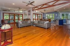  367 Slade Point Rd, Slade Point QLD 4740 Opening the gates to this Slade Point property reveals a resort-style, multi-level home set amid tropical garden surrounds not visible from the street. The front deck overlooks a relaxing outdoor barbecue area leading to the 15m lap pool. The rear deck encourages an afternoon cocktail while supervising the children's activities in the park, or ensuring the tide is coming in on schedule. A short walk with a fishing rod will have you fishing in minutes! The home has been designed to enhance the beach lifestyle, with polished timber floors and vast expanses of glass. A huge, functional kitchen could cater for a crowd if required, and a spacious office/study that makes homework bearable, are some of the features. The split-level design provides plenty of options for an active family lifestyle, with a downstairs living space ideal for sleep-overs. It is rare to find a property that offers so much, has unrestricted beach access, and has park on two sides, where coming home each afternoon would be like returning to your own private paradise. 
