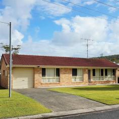  4 Windsor St, Tarbuck Bay NSW 2428 Easycare - Spacious - Sunny - Lock 'n' Leave ! Just perfect is this spacious and easy-care 3 bedroom level home with drive through lock-up garage, plus large shed all located just a 50m walk from the shores of Smiths Lake.  Features include: * 3 Bedroom, 1 Bathroom Brick Veneer Home on a Level 570m2 Block * Drive through Lock-Up Garage for Backyard Access * Easy Flowing Design - Tiled Floors Throughout * Open Plan Lounge & Living Room * Great Sunny Kitchen with Off-Set Dining * Sunroom with Smith lake Views * Large Family Bathroom * Internal Laundry with additional Toilet * Crimsafe Screens and Doors * Ceiling fans throughout * R/C Air-Conditioning * Built-in-Robes all bedrooms. If you want to secure one of the best local lakeside homes, then don't delay. Download your free brochure now and call David Shaw or Ashley Boyd-Skinner on (02) 6554 0188 to arrange your private viewing of 'Easy Living'. Forster Pacific Real Estate - Pacific Palm's leading Boutique Coastal Property Specialists. 
