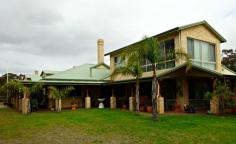  1304 Gairdner River Road, Bremer Bay, WA 6338 This rural retreat consists of a large 2 storey residence set inside the Fitzgerald National Park. The National Park is renowned for its diverse and spectacular scenery and is one of Australia’s most significant. Due to it’s location this property offers great Eco Tourism opportunities. The very private lodge overlooks the river and comprises of seven bedrooms and four bathrooms. Large living areas consist of a generous large sized combined kitchen and dining room, this area also includes a bar/entertaining area plus a lounge room. The property also has its own 1000m airstrip, plus a 500m cross strip and there are hangar facilities with toilet and shower amenities on site. There are a large number of outbuildings on the site including 2 workshops, a hangar, boat shed, machinery shed, covered carports and double lock up garage. The Gairdner River inlet and ocean mouth are just 2kms away with beautiful sandy white beaches and glistening blue waters, this area offers some of the best fishing in WA! The residence is extremely private, it is partly fenced with the added security of a lockable steel gate at road entrance. Bremer Bay is 45kms away, about 30 minutes drive. To arrange an inspection, please call John Garland. 