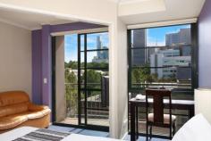  511/585 La Trobe Street, Melbourne, VIC 3000 City Edge Lifestyle, Soothing Treetop Outlook Enjoying some of Melbourne's premier attractions and amenities just moments from the door, this 2-bedroom apartment is a fantastic city base or an enticingly affordable investment option sure to reap rewards for years to come.  Currently returning a healthy 7% per annum (approx) and securely leased to the professionally managed Harbour View Apartment Hotel (until January 2021), it comprises two bedrooms with built-in robes, a kitchenette adjacent to the entrance, a Euro laundry and a balcony enjoying mid-morning sunshine and a soothing outlook over leafy green treetops.  Including its own secure car space (an absolute bonus in the inner city!), reverse-cycle heating/cooling, secure intercom entry, secure lift access, 24-hour reception and exercise room, its lifestyle credentials are enhanced by its brilliant city edge location close to Southern Cross Station, DFO shops, Flagstaff Gardens, Docklands Stadium and the fresh produce and cosmopolitan vibrancy of Queen Victoria Market.  