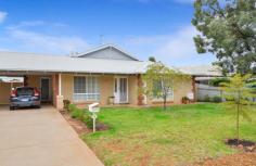  24 Tindals Cres, Hannans WA 6430 Terrific family home has become available and will suit someone with an eye for good value. Large block with secure rear yard, surrounded by quality homes, a close walk to Schools, shops and the Karlkurla Bushlands. Many more features here including: - 4 bedrooms with robes - 2 bathrooms - separate lounge/dining/family - Dishwasher - Natural gas connection - Evap A/C - 6x3m powered shed - Established gardens Inspection of this one is a MUST. PROPERTY FEATURES Separate Dining Air Conditioning Built-In Wardrobes Close To Schools Close To Shops Close To Transport Garden Secure Parking Dishwasher 6X3m Powered Shed 
