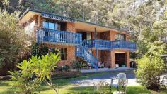  73 Seal Rocks Rd, Bungwahl NSW 2423 ‘Myall Lake Magic’ is a neat 6-bedroom double brick dual occupancy home on Seal Rocks Rd in the beautiful suburb of Bungwahl, centrally located just a 50m walking distance from the local Primary School, Village shop with the shores of Neranie just a 3-minute drive away. Features include: * 6 Bedrooms, 3 Bathrooms, Double Brick 2 storey home, DLUG & DBL Carport on 2023m2 Block * Dual Occupancy - Separate Electricity Meters - $600 pw potential rental income.  * Upstairs – 4 Bedrooms, 2 Bathrooms, Open Plan Living, Offset Dining, Combustion fireplace * Family Kitchen with Walk–in Pantry * Large covered in back Queensland Room * Large Internal Laundry * Plenty of parking space - Tandem DLUG, Tandem Double Carport & Regular Double Carport * Master Bedroom complete with full En-suite.  * Downstairs – Open Plan Living & Dining Area, Sliding door that opens out to DLUG * Large Storage Shed separate from House If you are looking for a home for holidays or to live, located around 2 hours’ drive from 'downtown' Newcastle and approx. 3 hours from Sydney's Northside then ‘Myall Lake Magic’ is the home for you so come and enjoy Bungwahl, Seal Rocks & Myall Lakes. Inspections Saturdays 1-1.30pm, strictly by prior appointment. Download your free brochure now and call Ashley Boyd-Skinner or David Shaw on (02) 6554 0188 to arrange your private viewing of ‘Myall Lake Magic’.  Forster Pacific Real Estate - Pacific Palms leading Boutique Coastal Property Specialists  ***Stock & Station Agents***Auctioneers***Real Estate Agents***Property Managers*** 