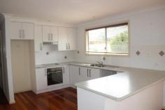  4 Tonks Gloucester NSW 2422 You'll feel right at home as you enter this comfortable 3 bedroom, weather board. Each bedroom with ceiling fans, built-in robe and main with walk-in and ensuite. Well-lit open plan kitchen and living area with polished timber floors, slow combustion fire and new reverse cycle air conditioner. Internal access from large single garage. Carport to side. Rear deck, back yard with raised garden bed lawn locker and tank. Front verandah offers lovely views to the Bucketts Mountains range.   Inspection Times Contact agent for details Features Built In Robes Floorboards Reverse Cycle AirCon 