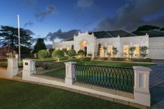  3 Elmglade Rd, Springfield SA 5062 THIS MAJESTIC LIGHT FILLED AND STATELY MODERN MANOR, STRIKES THE PERFECT BALANCE BETWEEN STYLE AND COMFORT SURROUNDED BY DELIGHTFUL, MATURE AND TERRACED GARDENS, INCLUDING SUN DRENCHED IN-GROUND POOL, ALL IDEALLY ELEVATED AND POSITIONED ON THIS WHISPER QUIET BOULEVARD OF OPULENT RESIDENCES. Presenting an impressive street presence, including a curved driveway leading to a gracious portico, introduces the 500sqm + lifestyle residence. On entering the home you are greeted through double front doors by an elegant reception area, with lofty ceilings. A formal sitting room to the left is also impressive in size and finishes, with elegant feature cornices, and picture windows overlooking the front garden that is perfect for those formal occasions. The central focus of the home is the main commanding and expansive casual living and entertaining area, which is flooded by natural light, providing a stylish provincial lifestyle ambience. This stunning environment overlooks and opens via French doors to the sweeping outdoor terrace and sun trapped Tuscan gardens and pool setting which enjoys a perfect Northerly orientation. The opulent kitchen, which boasts, filtered coastal views is naturally generous, and is styled with white marble benchtops, stunning neutral flooring, quality appliances, along with formidable storage, and space in which to prepare for large scale hosting whist keeping in touch with family & friends. The outdoor entertaining area is simply superb, including a fully tiled heated swimming pool that is encompassed by a raised living & dining terrace that works in total harmony with the home and is accessed via French doors creating a private oasis of serene and sundrenched tranquillity. Accommodation is of course generous with the grand master suite overlooking and connecting via French doors to the sweeping terrace and pool setting. The master suite includes a spacious his and hers walk in robe that leads to the stunning ensuite bathroom, also with his and hers basins. Bedrooms two and three are both enviable in size, and outlooks, enjoying picturesque front garden views, including the historic Springfield house in the background. A large connecting ensuite bathroom, comfortably services these bedrooms. A sun bathed study, or fourth bedroom option, ideally overlooks the terraced gardens and pool, which is perfect in the colder months. With a myriad of bespoke finishes, too many to mention, together with a quality and substance of build not often seen in today's times, this masterpiece of over 500sqm, showcases expert craftsmanship and superior attention to detail throughout, from classic ornate features, to a contemporary floorplan that embraces modern day living requirements. Three car garaging, ducted reverse cycle airconditoning, excellent security with video surveillance and substantial storage facilities. Unsurpassed custom built luxury perfectly located in this leafy and tranquil setting and so close to all the surrounding amenities including Burnside Village and excellent schooling. 