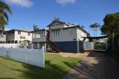  16 Sneyd St, West Mackay QLD 4740 This great home ticks a lot of boxes and is fully air-conditioned for those hot days! Set on a spacious, fully fenced 769m2 block is a residence you would look forward to coming home to every day! With it's high ceilings and tongue and groove walls, giving the feel of comfort in your own home.  Upstairs has 4 air-conditioned bedrooms, all with built-in wardrobes. There is a lovely sun-room for reading or a study, a fabulous modern kitchen and dining and it all flows to the spacious living room. Walk out the doors onto the timber deck to experience outdoor living at its best. Downstairs is enclosed and includes the laundry, second toilet, bar and rumpus area for entertaining plus another room. Also a workshop area for the man of the house. There is a garden shed and a gazebo in the large back yard, with heaps of yard for the kids to run around in. Also boasts 2kw Solar panels to help with electricity costs. Great family home in an ideal location, so arrange your own private inspection today! 