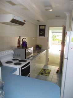  3/61 South Station Road, Booval QLD 4304 Walking distance to the train, buses across the road, all equal convenience. The two bedrooms are a great size with the Master having an air conditioner. Both bedrooms are carpeted with fans and built in cupboards. Exposed beams in the carpeted lounge room and a fan. Storage is sorted with 2 linen cupboards. Single lock up garage. Kitchen is functional with double door pantry cupboard. Rental return $250 a week. Phone to book private viewing. 