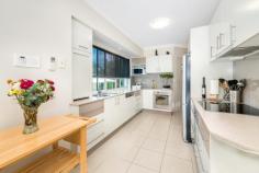 1/28 Birt Avenue, Surfers Paradise QLD 4217 - Superior quality 2 storey solid brick construction - Impressive foyer. Gorgeous casual living/dining area - Open plan entertainer's dream kitchen. Super-storage - Scenic u/cover balcony/bbq area. Views to main river - Ultra-classy formal lounge & dining. Powder room - Master bedroom with spa ensuite & large walk-in robe - + 2 spacious bedrooms/built-in robes. Family bathroom - Large multi-purpose room accessing lovely rear garden - Solid timber floors & staircase. Invisible blinds - Intercom, vacuumaid & security system & screens Flawless design and top quality craftsmanship shine in this thirty square two-storey villa in the picturesque, highly sought-after Budd's Beach area. Prestigiously located it's just a short stroll along the picturesque tree-lined street from the wide main river, boat launching jetty, Budd's Beach Reserve - a favourite water-side park and picnic area - and in convenient proximity to the bustling Surfers Paradise CBD.  Visual impact is immediate in the tastefully decorated entry foyer which narrows to an attractive long, light hallway with high ceilings and a pleasing colour palette flowing tranquilly throughout the home.  - On the ground level we have a large family bathroom, an excellent laundry/workroom with mega-storage, two spacious bedrooms and, at the end of the corridor, a gorgeous ultra-large air conditioned room with luxurious window treatments, built-ins and benchtop which could serve as a complete teenage retreat, a media room, expansive home office or another living area. Glass doors open to a colourful rear garden and stylish al fresco relaxation. - Upstairs the light-washed living areas are an absolute delight with the family living area spilling out to a scenic balcony and views across to the water - the perfect venue for barbeques or just to relax with a good book and a glass of wine. The adjoining dining area merges with a galley-style gourmet kitchen - a chef's dream - which boasts excellent storage, walk-in pantry and Bosch appliances. Privately positioned next to the kitchen the ultra-spacious formal area combines a sophisticated dining room and lounge, - an impressive venue for special dinners and lavish celebrations. Passing the discretely positioned powder room we continue along to the sumptuous master suite, absolutely resplendent with its large spa ensuite and long walk-in robe.  This villa has been meticulously planned and built, incorporating a noise-inhibiting concrete-filled wall, long-life termite-free treatment for the wonderful expanse of solid flooring and stair-casing, the extensive use of invisible blinds providing privacy without obstructing light or views and the abundance of windows sun-soaking the entire home. A beautifully positioned residence of visual superiority, quality and class which will be fully appreciated by the discerning buyer. 
