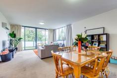  U 111/100 Giles Street, Kingston, ACT 2604 Enjoy the lifestyle at this two-bedroom, top floor, corner apartment, with all that Kingston Foreshore and Kingston has to offer - with vibrant cafes, shops and Lake Burley Griffin just a stroll away.  For work, it's only a short distance to the Parliamentary Triangle, Barton and Manuka. This apartment would appeal to those wanting to live in or invest. Tucked away from the living area are two good-sized bedrooms, ensuite, built-in robes and a second bathroom with bath. The entry hallway has the laundry closet and a nook area and leads to the spacious open plan living and kitchen area.  Gas cook top and stone benches complete this modern kitchen.  The balcony extends that feeling of space. Car accommodation is a tandem arrangement for two cars in an underground parking area for security and convenience.  Secure entry via intercom system Main bedroom with ensuite and built-in robe Bedroom two with built-in robe Open plan living area opening to balcony Kitchen with stone bench tops, dishwasher, gas and electric cooking European style laundry with dryer Windows are double glazed Internet connectivity Reverse cycle air conditioner Nook Secure car parking for two cars Bus stops along Wentworth Avenue Communal BBQ in complex Property features Dishwasher Reverse Cycle Heating and Cooling Built-ins 