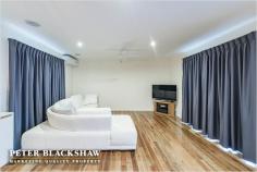  16 Whitfeld St, Monash ACT 2904 Position and Presentation Set on a quiet tree lined street only moments from quality schools, shops and public transport is this fully renovated three bedroom family home. All the hard work has been done enabling you to take back your weekends and enjoy a more relaxed and easy lifestyle. This single level family home takes advantage of its sunny aspect and enjoys an abundance of natural light and sunshine with large floor to ceiling windows. The home features new spotted gum hardwood timber flooring and new carpets, curtains and paint throughout. The kitchen is also new and modern with quality appliances, plenty of custom built storage and flows effortlessly to a large covered outdoor entertaining area. The family friendly rear garden is dotted with established fruit trees, is secure and low maintenance and has a secure storage shed plus additional storage area to the side of the property. Car accommodation is provided by a single garage with additional off street parking. Both bathroom and ensuite have been completely renovated and both have underfloor heating installed and a television above the bath in the bathroom. Loads of extras make this house a home such as Samsung keyless entry to the front door, crimsafe sliding door to the rear and installed Bosch alarm system. With nothing else to do except move in and enjoy, this is an ideal lifestyle opportunity! * Single level three bedroom family home * Updated and modernised throughout * Newly renovated bathroom and ensuite with underfloor heating * Stunning new kitchen with quality appliances * Ducted gas heating throughout plus split systems to living area and main bedroom * Spotted gum hard wood timber flooring * New carpet to bedrooms * Painted throughout in lovely neutral tones * Built-in robes to all of the bedrooms * Rinai hot water system * Ceiling fans to living area, kitchen,main bedroom and bedroom two * Easy care landscaped gardens and family friendly secure rear garden * Single car garage with extra off street parking * Samsung keyless front door entry, alarm system and crimsafe door rear sliding door * Close proximity to Monash Primary School, public transport and Erindale Shopping Centre and Tuggeranong CBD 