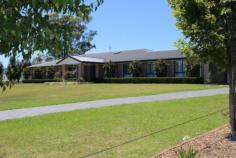  7 Neotsfield Ave, Gloucester NSW 2422 The vendors say sell!  Immaculately presented near new home Spacious open plan kitchen dining and living with raked ceiling Separate formal lounge come theatre room 4 bedrooms each with built-ins, main with walk-in robe and ensuite  Plantation shutters, ceiling fans and Air conditioned throughout Concrete drive to double garage Situated on an 4050sqm block  Surrounded by manicured easy maintenance lawns and gardens  Located only minutes from the town centre with fabulous views of the valley   Inspection Times Contact agent for details Features Built In Robes Dishwasher Ducted Cooling Ducted Heating Fully Fenced Outdoor Entertaining Remote Garage Reverse Cycle AirCon Land Size 4050 m2 