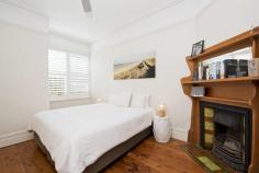  1 Philip St, Bondi NSW 2026 FOR SALE $2.65M - Stylish Beachside Hideaway With Lush Garden Oasis On The Cusp Of Bronte And Tamarama Beaches A secluded setting at the end of one of Bondi's best-loved cul-de-sacs delivers an uplifting sense of peace and privacy in this beautifully renovated Federation home. Perfectly located between Bondi and Tamarama Beaches, the spacious three-bedroom home has been designed to embrace outdoor living with a seamless flow to a landscaped garden oasis reminiscent of a tropical island retreat. Beautifully proportioned interiors with a fluid layout from front to back are enhanced by original period features while a Bali-inspired outdoor shower gives the home a relaxed holiday-like feel. Stroll to a choice of schools and beaches, Bondi Road cafés and the coast walk.  * Timeless interiors, quality finishes * 3 bedrooms, 2 with built-in robes * Large bay fronted master bedroom * Formal lounge with original fireplace * Designer Caesarstone island kitchen * Quality Miele appliances, gas cooktop  * Ample storage, soft-close cabinetry * Glass framed dining and casual living  * Automated blinds, underfloor heating * Seamless indoor/outdoor entertaining  * Barbecue terrace and sunny lawn  * Outdoor beach shower, powder room * Main bathroom with a clawfoot bath * Integrated laundry, plantation shutters * Ladder access to attic storage space  * Ornate ceilings, polished timber floors * Undercover parking, family friendly street * 350m stroll to Bondi Rd cafés and delis * Walk to Bondi, Bronte and Tama Beaches 
