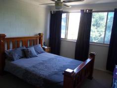  3/61 South Station Road, Booval QLD 4304 Walking distance to the train, buses across the road, all equal convenience. The two bedrooms are a great size with the Master having an air conditioner. Both bedrooms are carpeted with fans and built in cupboards. Exposed beams in the carpeted lounge room and a fan. Storage is sorted with 2 linen cupboards. Single lock up garage. Kitchen is functional with double door pantry cupboard. Rental return $250 a week. Phone to book private viewing. 