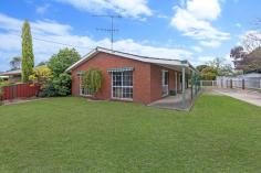 10 Tulloch Cres, Hamilton VIC 3300 Extremely low maintenance, brick and modern home on cement slab and a flat block A short drive into Hamilton’s CBD, schools and sporting facilities nearby 672.34m2 (approx) block, perfect for developing a garden with your own stamp on it Entry hallway from the side of the house, providing access to carpeted, well lit lounge Combined dining and kitchen with neutral and tasteful décor and split system Kitchen space offers dishwasher, electric oven, gas 4 burner cook top and rangehood Three ample sized bedrooms all with carpet Large fourth bedroom or second lounge room available at the rear of the home with sliding door access to undercover outside area Well appointed bathroom with shower, vanity, bath and separate toilet Laundry with external door A perfect, low maintenance investment property or home for owner occupation Inspection via private appointment only 