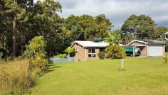  12 Tropic Gardens Dr, Smiths Lake NSW 2428 Privacy Plus - Prime Position - Adjoins Reserve 'Tropic Gardens Lodge' is a fabulous 4 bedroom, 2 bathroom split-level solar home with double lock-up garage plus additional carport for your boat or trailer, all set on a large private gently sloped 2,340m2 block of land, adjoining rainforest reserve at the rear. Features include: * Double Brick Construction * 3kw Solar Electricity System * Formal entry * Lounge & Dining opening out onto the entertainment deck with lake glimpses * Office area * Family Kitchen * Internal Laundry with additional WC * Double Lock-up Garage plus additional Carport for your Boat or Trailer * Side Yard Access Download your free brochure now and call David Shaw or Ashley Boyd-Skinner on (02) 6554 0188 to arrange your private viewing of ‘Tropic Gardens Lodge’. Forster Pacific Real Estate - Pacific Palms leading Boutique Coastal Property Specialists  ***Stock & Station Agents***Auctioneers***Real Estate Agents***Property Managers*** 
