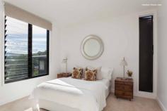  1/41 Frederick Street East Gosford NSW 2250 Habitat offers high-quality design and low-maintenance living in East Gosford, an established and popular neighbourhood on the Central Coast. Designed by Andrew Dickson and Ben White of White + Dickson Architects and completed in February 2017, Habitat is a four-house development that takes its cues from modernist architecture. Wide open stacker doors capturing bay breezes, sunshine glinting off the Broadwater and the lush green of the bush in the surrounding hills. Habitat’s name says it all and its carefully conceived building and interior design, undertaken by respected local architects White + Dickson is unique, enduring, highly functional and harmonious with its surrounds. Habitat, House One is well suited to downsizers with the master bedroom and main living spaces on the ground floor and additional bedrooms upstairs. The three-bedroom, two-bathroom townhouse has a sunken living area that opens to a loggia and the front garden. Colours and materials have been inspired by the local environment and every room has been designed to capture cross breezes for natural ventilation. The oversized 172 square metre townhouse provides glimpses of the Broadwater. The development’s unique, two-by-two configuration, abundant natural light and carefully conceived cross ventilation will appeal to villa, duplex and town home buyers with an eye for architecture, design and quality. 