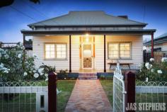  18 Benjamin St, Sunshine VIC 3020 Period rooms and present day spaces, indoor proportions and outdoor dimensions - all the essential elements of this irresistibly renovated family home are beautifully, brilliantly balanced on a block offering highly desirable north facing depth. Three welcoming bedrooms, including one in its own sunny upstairs zone, and a central study/home office surround a central living room featuring polished floors and a gas fire-place beneath its high ceilings. The separate kitchen/dining area's light-filled spaces, soft-closing cabinetry and appliances by Smeg and Bosch reflect the renovated quality of a floor-plan completed by a superb family bathroom and substantial separate laundry. Beyond, entirely under-cover pergola entertaining is enhanced by a fabulous outdoor woodfired oven and a garden backdrop with productive planter beds, a flexible free-standing work-shop/studio - even a captivating cubby house! Ample side-drive car parking adds to the convenience of a sought after location close to shopping, schools and Sunshine station - with Parsons Reserve recreation facilities at the end of the street.   