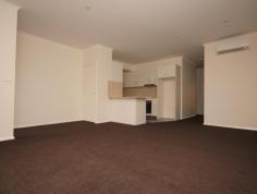  14/10 Tasman Place Lyons ACT 2606 Townhouse style apartment – ‘Lido’ This modern 3 bedroom ensuite home with 2 car spaces is enviably located just moments to the Woden Town Centre! The property is designed to feel like you are in your own private sanctuary with no one located on top or beside you, making it feel like a townhouse design. Be welcomed upon entry by the spacious open plan living and dining area which opens out on to the courtyard. Central to the apartment is the large stylish kitchen with stone benchtops and dishwasher. Make your way through to the three large bedrooms, with the master bedroom boasting an ensuite. The home also has a large wrap around courtyard allowing you plenty of space to entertain family and friends and plenty of space for the family pet. Its ground floor location makes this home the perfect low maintenance alternative for downsizers. Quality features of the property include: 3 bedrooms Single level design End location of the complex Master bedroom with ensuite Bedrooms 2 & 3 with built-in robes Spacious modern kitchen with stone bench tops and dishwasher Reverse cycle air conditioning to living Generous wrap around low maintenance rear courtyard (130sqm according to the plans) Internal laundry 2 car spaces Storage Boutique complex with only 14 units on the units plan. The property is located moments from the action being within walking distance to Woden Town Centre, numerous café and restaurants, The Canberra Hospital, numerous government departments, Canberra Institute of Technology and so much more!  Please note: The marketing photos were taken before the current tenancy. The property is currently tenanted on a periodical lease. Townhouse Features General Features Bedrooms: 3 Bathrooms: 2 Garaging: 2 Energy Features Energy Rating: 4.5 External Features Courtyard Internal Features Split System Airconditioning Built In Robes Dishwasher 