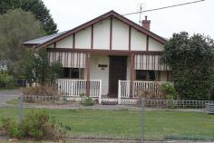  41 Sydney St, New Berrima NSW 2577 THIS CHARACTER WEATHERBOARD COTTAGE WAS BUILT BY ALF STEPHENS WHO IS WELL KNOWN IN THE SOUTHERN HIGHLANDS AS A BUILDER OF QUALITY HOMES  THE COTTAGE IS COMFORTABLE AND WELL PRESENTED AS IS - WITH THE SCOPE TO VALUE ADD SHOULD YOU CHOOSE * Entrance from front verandah  * 2 bedrooms - both with ceiling fans * Built-in robes (fitted-out) * Bathroom with shower, vanity, tastic lights, w.c & skylight * Tassie oak kitchen with 'Belling' cooker, exhaust fan, pantry and storage * Dining and sunroom (tiled) with ceiling fan and sliding doors to covered pergola * Lounge with flued gas heater in brick fireplace, ceiling fan and split-system air conditioning * Decorative 9ft ceilings * Timber windows throughout * Half timber wall panelling with Dado rail * Internal laundry with w.c. and storage cupboard * Detached workshop with adjacent storeroom & w.c. * Single garage and single carport * Two rainwater tanks for garden * Two garden sheds * External canvas window blinds * Landsize: 696m2 SET ON A LEVEL, FULLY FENCED BLOCK WITH ESTABLISED GARDENS THE LOCATION IS QUIET AND IS ONLY 5 KLMS TO MOSS VALE AND 3 KLMS TO BERRIMA 