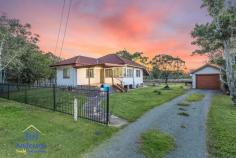  119 Blackwood Rd, Deagon QLD 4017 DELIGHTFULLY MAINTAINED CHARACTER COTTAGE IN A CONVENIENT, CENTRAL LOCATION Sitting comfortably on a wide 784m2 block this comfortable character cottage is just a short walk to transport and the popular Redcliffe to Mitchelton bikeway, and only minutes to schools, cafes and the waterfront – not to mention a direct line of 16km or 20 minutes to the Brisbane CBD. The front veranda invites you to step into this warm, welcoming home. The traditional character of the home with high ceilings, horse hair cornices and quality window treatments is complemented by a contemporary neutral colour scheme. The lounge is serviced by the kitchen and dining area, which leads out onto the expansive fully fenced back yard. it’s a great place to unwind with a BBQ and beers on Friday afternoons as the sun sets. Featuring two bedrooms with a study which could easily be converted to a third bedrooms, the home is comfortable and homey inside with delightful window treatments, but it is the size of the land and the convenient location that sets this property apart. There is potential here to further renovate or expand the existing home, build a granny flat or simply acquire the property as a rental investment and watch it steadily grow in value over time. This an opportunity that will appeal to buyers and developers who can see the potential in the location and generous size and wide dimensions of this block. Central Sandgate is on your doorstep here with schools, train station, parks, lagoon, bars and clubs all within fifteen minutes’ walk, this location offers an unmatched combination of walk-to convenience and relaxed family living in a convenient, urban pocket of Deagon. If you’ve been searching for an affordable, well maintained character home that also offers space and convenience, or a solid rental return, this property will exceed your expectations. For your own private inspection, please call the office now. This opportunity will not last long! Open 7 days Phone 07 3203 6001 (24 Hours) 