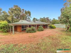  7 Gilmour Rd, Roleystone WA 6111 4 Bed 2 Bath at this price WOW!!! And what a lovely home it is too. Really neat and tidy and plenty of natural light. This roomy 4 bedroom 2 bathroom home is set in a nice quiet location and on a very usable levelish block. Character filled timber and Iron construction with wrap around verandas. You will find a great spot anytime of the year to put a chair and either find a bit of sun or a bit of shade. A beautiful timber kitchen and neat and clean bathrooms will mean just move in and enjoy, no renovation required here. Outside is basically natural bush but with a good sized double workshop already in place for the toys. Solar HWS, PV solar panels to keep the power bill down, slow combustion wood heater and evaporative ducted air conditioning. Make no mistake, this is priced to sell. Grab it quick. Call me today 