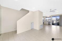  12 Redruth Street, Crace, ACT 2911 Crace is undoubtedly Gungahlin’s best kept pockets being located close to the Gungahlin Town Centre and easy access to the Barton Highway and the Gungahlin Drive Extension connecting Gungahlin to the rest of Canberra.  This immaculately presented 1 bedroom plus large study terrace is within an arm’s reach to Crace Shops which has a Supabarn, coffee shops, a hairdresser, gym and the popular District Café & Bar.  Spanning two levels, this home features an open plan living area upon entry, cleverly designed and functional kitchen with dishwasher and gas cook top, powder room downstairs (perfect option for guests), European style laundry. The private, low maintenance courtyard flows on from the living area and presents the perfect chance to create your own oasis. Access to the single carport can be gained from the rear lane to the property.  The main bedroom on the upper level is generous in proportion and features mirrored built-in robes. The possibilities are endless in the study area where you can enjoy ample space to set up a study, home office, guest room, home gym, a second segregated living area to downstairs or convert into a second bedroom.  For year round comfort this energy efficient home features electric heaters to the living area and study area and ceiling fans throughout.  Its popular location and excellent condition makes this an opportunity suited to executive couples, downsizers and investors alike.  Property features include:  1 bedroom, 2 storey terrace home  Separate large study area (or 2nd bedroom)  Open plan living area Functional kitchen with dishwasher, ample storage, gas cook top  European style laundry Powder room downstairs Crimsafe to sliding doors on lower level and kitchen window Large main bedroom with mirrored built-in robes  Central main bathroom to the main bedroom and study area  Linen cupboard Ceiling fans and electric heaters upstairs and downstairs  Single carport Townhouse Features General Features Bedroom: Studio Bathrooms: 1 Carports: 1 Building Area: 89 sqm Energy Features Energy Rating: 5.0 Internal Features Built In Robes Dishwasher Heating: electric 