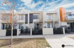  12 Redruth Street, Crace, ACT 2911 Crace is undoubtedly Gungahlin’s best kept pockets being located close to the Gungahlin Town Centre and easy access to the Barton Highway and the Gungahlin Drive Extension connecting Gungahlin to the rest of Canberra.  This immaculately presented 1 bedroom plus large study terrace is within an arm’s reach to Crace Shops which has a Supabarn, coffee shops, a hairdresser, gym and the popular District Café & Bar.  Spanning two levels, this home features an open plan living area upon entry, cleverly designed and functional kitchen with dishwasher and gas cook top, powder room downstairs (perfect option for guests), European style laundry. The private, low maintenance courtyard flows on from the living area and presents the perfect chance to create your own oasis. Access to the single carport can be gained from the rear lane to the property.  The main bedroom on the upper level is generous in proportion and features mirrored built-in robes. The possibilities are endless in the study area where you can enjoy ample space to set up a study, home office, guest room, home gym, a second segregated living area to downstairs or convert into a second bedroom.  For year round comfort this energy efficient home features electric heaters to the living area and study area and ceiling fans throughout.  Its popular location and excellent condition makes this an opportunity suited to executive couples, downsizers and investors alike.  Property features include:  1 bedroom, 2 storey terrace home  Separate large study area (or 2nd bedroom)  Open plan living area Functional kitchen with dishwasher, ample storage, gas cook top  European style laundry Powder room downstairs Crimsafe to sliding doors on lower level and kitchen window Large main bedroom with mirrored built-in robes  Central main bathroom to the main bedroom and study area  Linen cupboard Ceiling fans and electric heaters upstairs and downstairs  Single carport Townhouse Features General Features Bedroom: Studio Bathrooms: 1 Carports: 1 Building Area: 89 sqm Energy Features Energy Rating: 5.0 Internal Features Built In Robes Dishwasher Heating: electric 