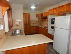  23/22 Thomas Street Raymond Terrace NSW 2324 Located in a well maintained complex close to town, this unit offers one of the largest yards in the complex along with a screened Queenslander room that no other has.  Features:  - 	 2 bedrooms, both with mirrored built-in robes  - 	 Open planned living and dining  - 	 Timber kitchen with plenty of bench and cupboard space  - 	 Screened sunroom/Queenslander room (approx. 9m x 3m)  - 	 Single garage  - 	 Generous sized yard  - 	 Internal laundry  EXTRAS INCLUDE: RC/AC, CEILING FANS, SOLAR HOT WATER & GARDEN SHED 