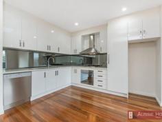  2/84 Thames Street, Box Hill, VIC 3128 With a modern craftsmanship, and attention to architectural details that you see in modern homes such as this.  The upstairs expansive living and dining room is adorned with a tall ceiling providing natural light. The adjacent open kitchen offers a modern styled bench space with stainless appliances. Ground floor containing a master ensuite with spacious wardrobe. Other features include: Smeg oven and dishwasher, video intercom, split system heating /cooling and ducted vacuum. The convenient location is only a brief stroll from buses, Box Hill Gardens and just a few minutes to the heart of Box Hill where you have access to trains, trams and a fantastic variety of restaurants and cafes. There is also a great range of schools of all education levels nearby.  