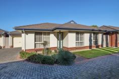  2/29 Wood Street Kurralta Park SA 5037 Delightfully located in one of Kurralta Park’s best streets close to all desirable amenities. Coles Supermarket and associated shops are just around the corner with William Light R12 School and Plympton Primary School also within easy access. The Westside Bike and Walking Track will provide a great place for your sport and recreation and Morphettville Racecourse is just up the road. An open plan living, dining and kitchen provide a bright and welcoming casual zone. Kitchen is adjacent to the dining which features sliding doors open the low maintenance paved courtyard, great spot to entertain family and friends, or just read a book and enjoy the sunshine. 2 bedrooms, all double bed capable and all offer built-in robes and quality carpets adding to the appeal. A full main bathroom provides excellent amenities with a separate toilet. The laundry features an external access door to the clothes line. A wall of built-ins adjacent to the dining area feature an opportunity for a built-in desk, plenty of shelves for storing all of your books together with another linen cupboard. A single garage with roller door has access through the rear outdoor area. Ducted r/c a/c and plenty of storage feature prominently in this property. A unique opportunity to purchase a quality home in a great location that truly is half way between the city and the beach. Be sure to inspect this one. Council Rates $876.70pa ES Levy 276.50pa SA Water $256.75pq 
