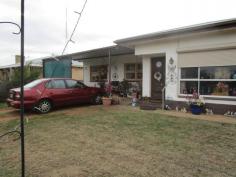  11 Bonnar St, Barmera SA 5345 This one will surprise. Some of the features of this home are the 4 bedrooms, master has a reverse cycle air conditioner. The bathroom has a separate shower and bath. There is a good size laundry with 2 way access. There are 2 separate living areas. The kitchen dining area has plenty of cupboards and a reverse cycle air conditioner. Hot water is supplied by a near new heat pump hot water heater. There are 2 rainwater tanks. The rear yard is divided with a fence, the rear of the yard has rear lane access, shed and caravan carport. Contact Sue Wurth on 0431 488 538 or 08 8582 2399 RLA - 176493 