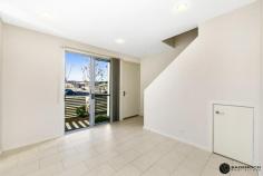  12 Redruth Street, Crace, ACT 2911 Crace is undoubtedly Gungahlin’s best kept pockets being located close to the Gungahlin Town Centre and easy access to the Barton Highway and the Gungahlin Drive Extension connecting Gungahlin to the rest of Canberra.  This immaculately presented 1 bedroom plus large study terrace is within an arm’s reach to Crace Shops which has a Supabarn, coffee shops, a hairdresser, gym and the popular District Café & Bar.  Spanning two levels, this home features an open plan living area upon entry, cleverly designed and functional kitchen with dishwasher and gas cook top, powder room downstairs (perfect option for guests), European style laundry. The private, low maintenance courtyard flows on from the living area and presents the perfect chance to create your own oasis. Access to the single carport can be gained from the rear lane to the property.  The main bedroom on the upper level is generous in proportion and features mirrored built-in robes. The possibilities are endless in the study area where you can enjoy ample space to set up a study, home office, guest room, home gym, a second segregated living area to downstairs or convert into a second bedroom.  For year round comfort this energy efficient home features electric heaters to the living area and study area and ceiling fans throughout.  Its popular location and excellent condition makes this an opportunity suited to executive couples, downsizers and investors alike.  Property features include:  1 bedroom, 2 storey terrace home  Separate large study area (or 2nd bedroom)  Open plan living area Functional kitchen with dishwasher, ample storage, gas cook top  European style laundry Powder room downstairs Crimsafe to sliding doors on lower level and kitchen window Large main bedroom with mirrored built-in robes  Central main bathroom to the main bedroom and study area  Linen cupboard Ceiling fans and electric heaters upstairs and downstairs  Single carport Townhouse Features General Features Bedroom: Studio Bathrooms: 1 Carports: 1 Building Area: 89 sqm Energy Features Energy Rating: 5.0 Internal Features Built In Robes Dishwasher Heating: electric 