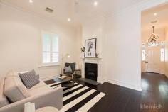  68 Maud St, Unley SA 5061 All the hard work has been done! Beautiful 1900 three-bedroom stone-fronted symmetrical cottage situated at the end of a no-through road on a north-facing corner allotment with side access via Porter Street to off street parking for two cars. Tastefully renovated and updated inside and out with the utmost attention to detail and quality. Instantly charming, the original features have been beautifully enhanced and restored, including decorative fireplaces, deep cove cornices, leadlight entranceway, and elegant and stylish Japanese Black-stained polished floorboards. The front of the house also features two deluxe bathrooms with marble tiles and luxurious finishes. A 2012 Urban Habitats-built extension custom-designed for indoor / outdoor entertaining features a gourmet Caesartone kitchen, relaxed dining, and family living area with expansive sliding doors to take maximum advantage of the northerly aspect and light. The louvered outdoor entertaining area can be enjoyed all year round, with an earthy, low maintenance water wise urban garden completing this most desirable offering. You will love living in Maud Street – walking to the cafes, restaurants, lifestyle and boutique shopping of Unley Road. You'll also be close to early learning centres and quality schooling, including Annesley College, Glenunga International High School, Unley Primary School, Walford Anglican School for Girls, and more, with easy access to the city centre. Features to indulge: -Stunning leadlight entry, wide central hallway -Three large bedrooms, all with ornate fireplaces and plantation shutters -Luxurious main suite with walk-in robe/dressing room, and ensuite with underfloor heating and operable skylight -Spacious main bathroom with marble tiles, deep soaking bath, luxe finishes and operable skylight – your own day spa retreat -Formal lounge, second living space, or open plan office/computer/movie room ideal for teenagers -Casual family, dining and living area with edgy polished concrete flooring and wall-to-wall adjustable display shelving and storage. Oversized three-piece high performance glass sliding doors and flyscreens, powered solar block blinds, and clerestory windows provide maximum ventilation and year-round comfort  -The ultimate chef's kitchen, with Ceasarstone tops and breakfast bench, Smeg induction cooktop, Smeg microwave, Smeg oven, Miele dishwasher, and ample two pack-finish cupboards, drawers and shelving  -Entertain outdoors in style under the powered louvered roof pavilion, with a vertical garden feature wall, private Cedar screen, raised limestone garden beds, and espaliered citrus trees -Reverse cycle airconditioning and ceiling fans throughout -Cleverly concealed space-saving laundry -Ample storage -Security system, electric gated entry with off-street parking for two cars Property Features Bedrooms: 3  Bathrooms: 2 Open Car Spaces: 2 Land area: 341sqm Make an offer 