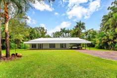  30 Parakeet Pl, Howard Springs NT 0835 THE FEATURES Sizeable family 4-5 bedroom, 2-3 bathroom home on 5 acres of tropical bliss Gated front driveway provides formal entrance Bitumised driveway is high and dry year round Tropical gardens screen the home for ultimate privacy Gorgeous home has roll front verandah Carport parking for 2 plus a built-in dog lock up Verandah spans front of home and wraps around back of home Gorgeous in ground swimming pool with rockery feature Home has enormous living room with separate dining room Central kitchen has breakfast bar plus pantry 3 bedrooms plus study at the front of the home Large master suite enjoys ensuite and walk in robe Main bathroom includes a relaxing bath tub Huge shed has built in office / FULLY SELF CONTAINED FLAT with additional bathroom 2 registered bores and town water Established tropical gardens and rolling green lawns around home Property located 5 minutes from Howard Springs shops Easy access to the Ichthys accommodations 5 minutes from the popular Howard Springs Park 10 minutes from Palmerston CBD THE BENEFITS Located in a quiet area in this supremely popular estate, this established family home has lush tropical gardens and sprawling lawn areas surrounding a home that requires naught – simply move in and enjoy it as much as the current owners do. The home is extremely well looked after by proud owners who tend to its every need. Inside is an expansive open living room with tiled flooring, glass fronted French Doors that open onto the verandahs that wrap around 3 sides of the home offering bountiful entertaining space under its shaded roof. Back inside, the home has a central kitchen with two-way access to both the dining and living rooms. The kitchen also includes a large pantry, great storage and prep space, a dishwasher plus a breakfast bar as well as quality appliances throughout. The home offers 4 bedrooms that each have A/C and a built-in robe along with large windows that frame the tropical greenery from outside. The master also enjoys a walk-in robe and en-suite amenities plus there is a study or small 5th bedroom option as well. Endless hours will be spent splashing in this tropical oasis with a large in ground swimming pool nestled at the base of tall palms. The area has a large paved portion where you can entertain under the stars or sunbake while the kids splash about. Also on the property is an enormous workshop shed with a built-in office or granny flat and bathroom amenities, additional verandah area plus RWT and a side parking bay as well. Located a short 5 minute drive from the popular Howard Springs Park and the shops, the home is also under 10 minutes from Palmerston CBD making it the ultimate rural retreat without compromising on your everyday necessities. THIS PROPERTY HAS BEEN PRICED BY A BANK VALUATION TO PROVIDE ACCURATE AND COMPETITIVE VALUE TO YOU THE BUYER. Book your private inspection today. 